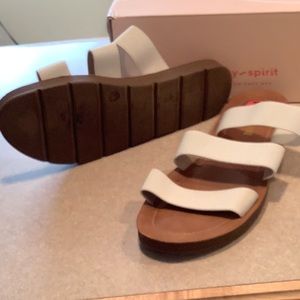 White strappy cushioned slide shoes